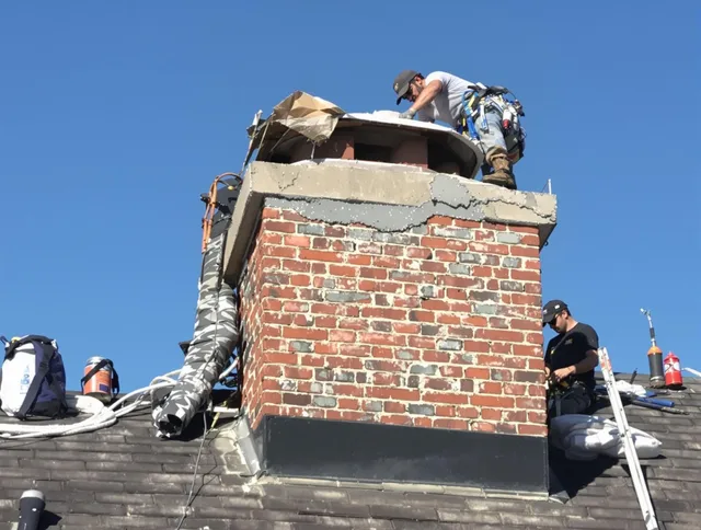 Cimarron Hills Chimney Sweep installing a custom chimney crown in Cimarron Hills, CO
